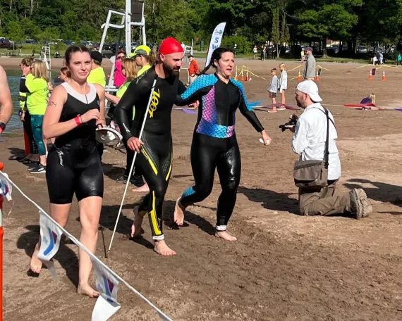 Triathlon Participants on a Beach