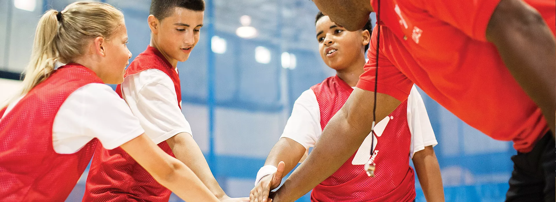 Kids and coach playing sports