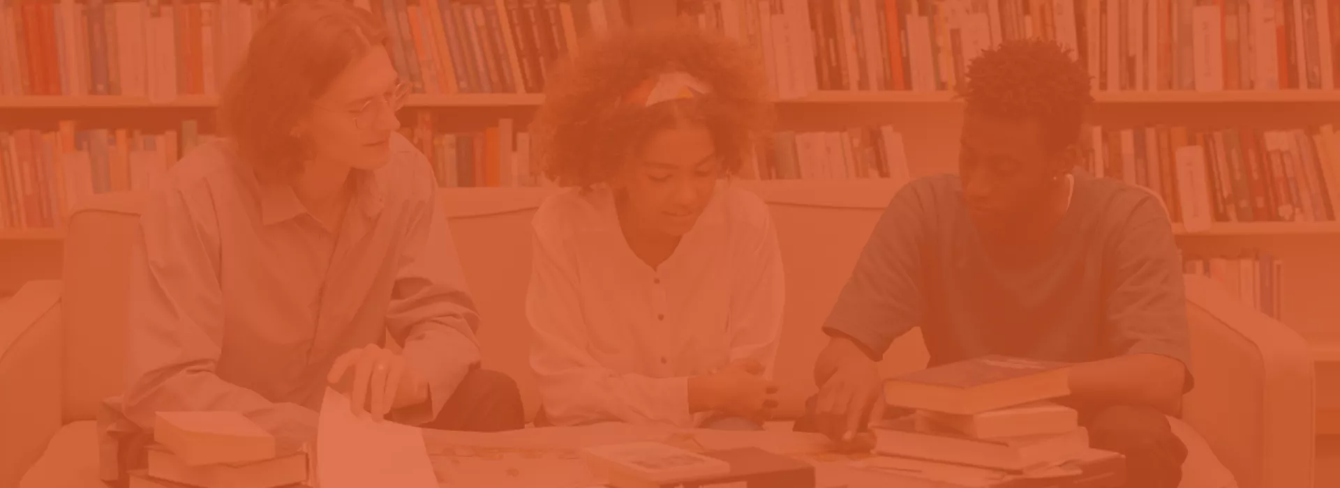 students studing with an orange overlay